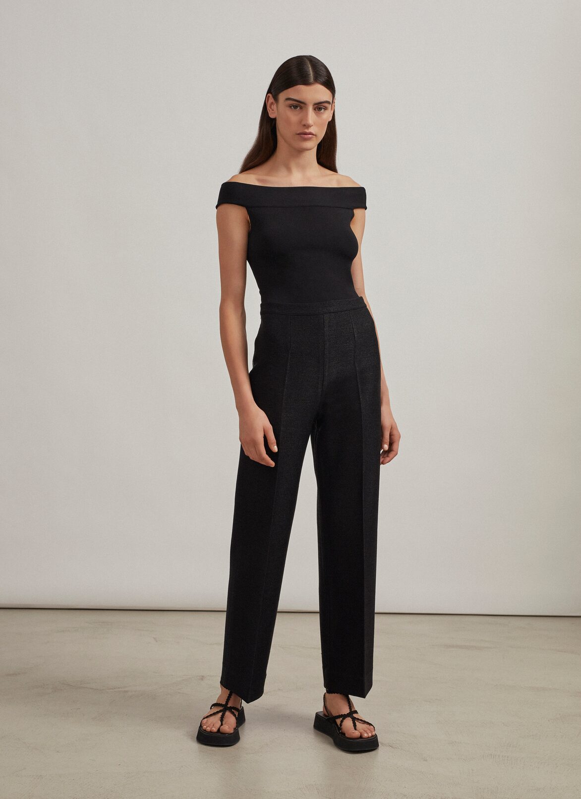 OFF-THE-SHOULDER NECKLINE BODYSUIT ALAÏA BLACK OFF-THE-SHOULDER NECKLINE BODYSUIT